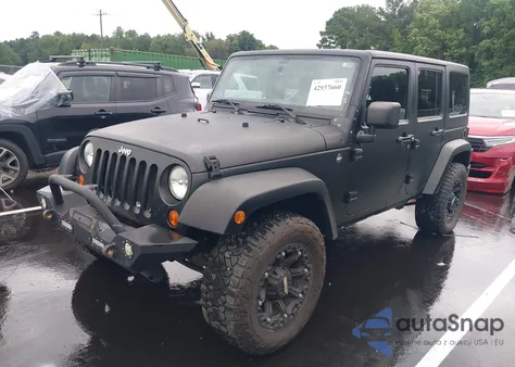 2011 Jeep Wrangler Unlimited Sahara from USA, damaged, VIN 1J4BA5H11BL606466